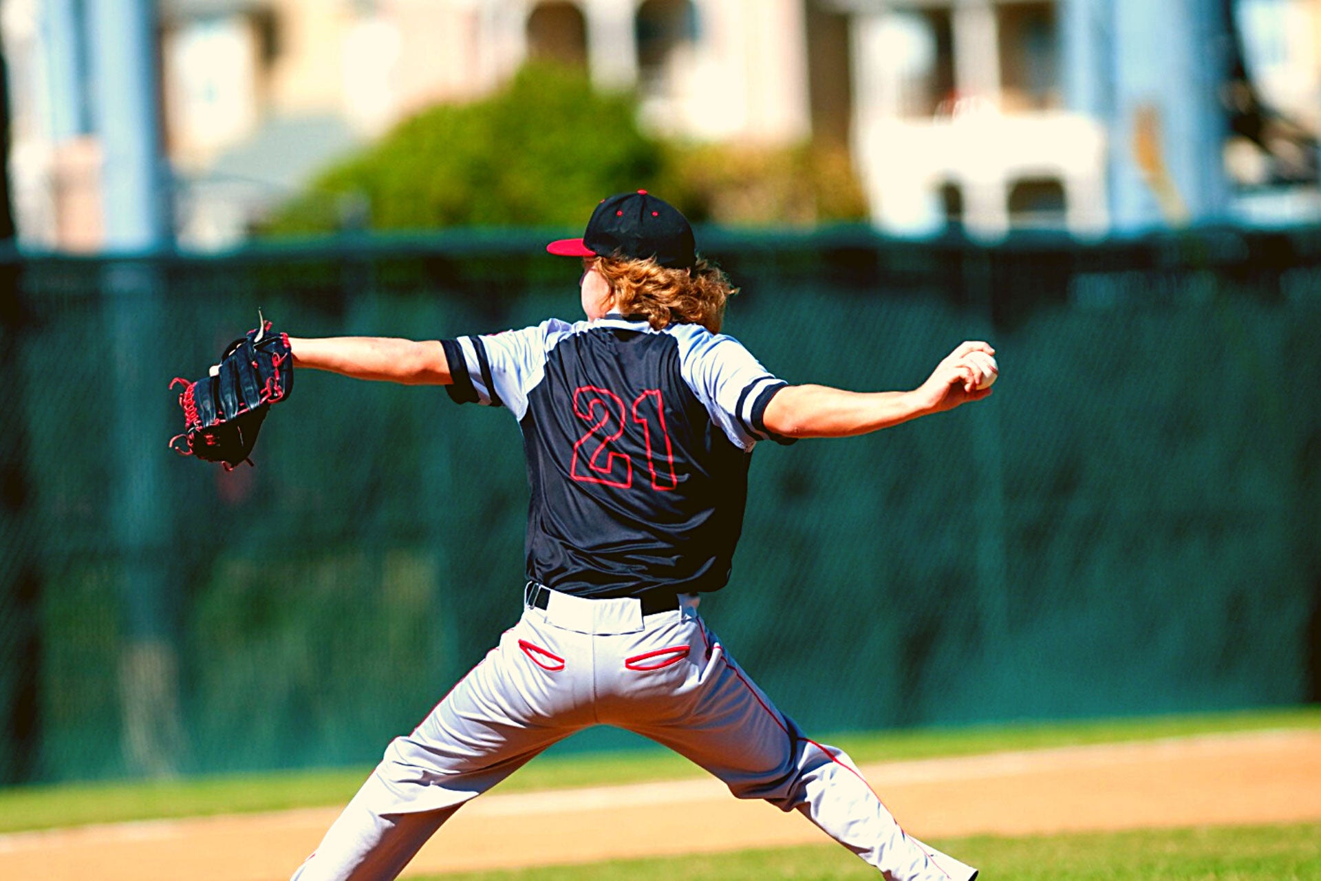 goat-directive-youth-baseball-player-pitching